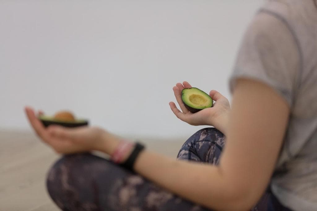 Performance still from Woman with Avocado