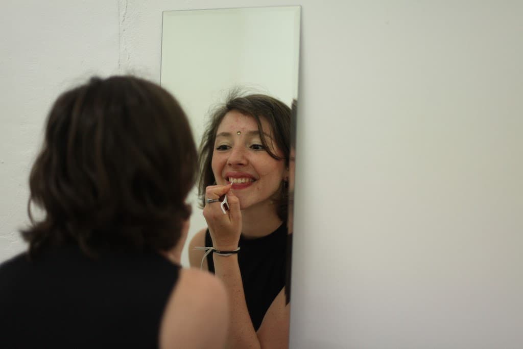 Performance still from Woman with Mirror