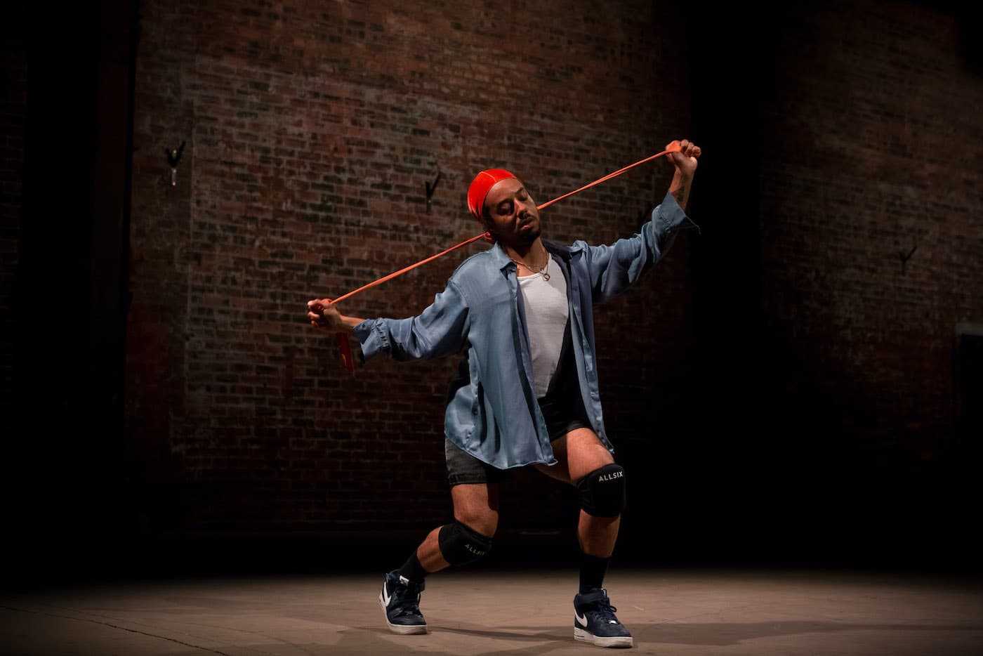 The artist Paul Maheke performing Taboo Durag at the Roberts Institute, Glasgow